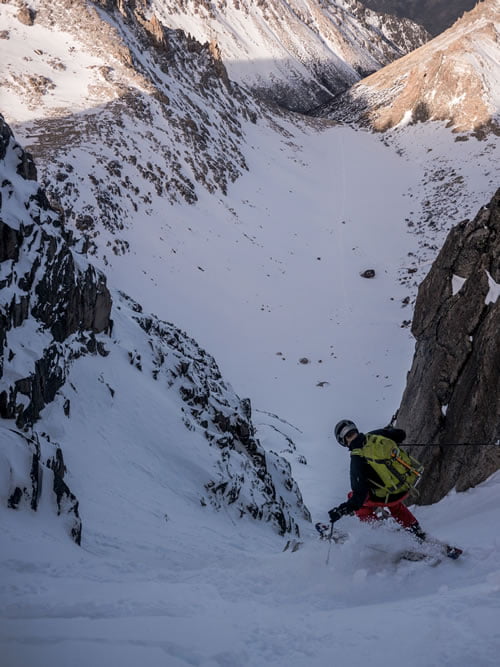 skiing the Central Couloir in the Frey region