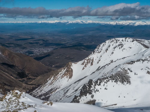 the amazing backcountry terrain of La Hoya on the right side with Esquel in the distance